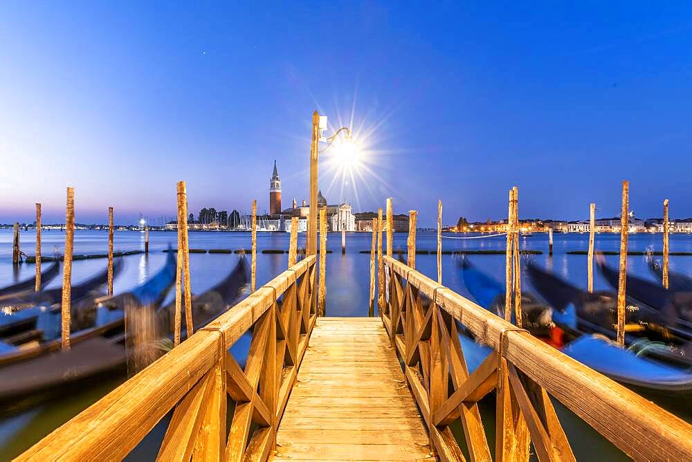 Venetian gondolas, behind church San Giorgio Maggiore, long exposure, dawn, Venice, Veneto, Italy, Europe