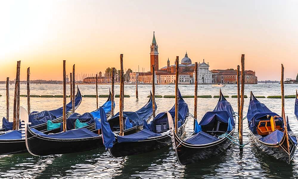 Venetian gondolas, behind church San Giorgio Maggiore, dawn, Venice, Veneto, Italy, Europe