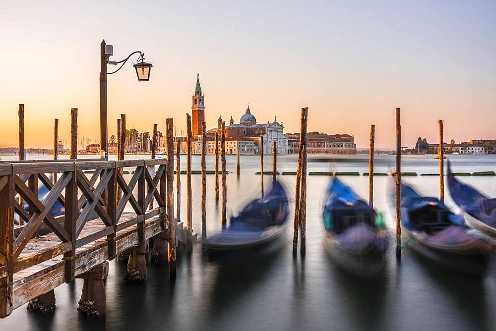 Venetian gondolas, behind church San Giorgio Maggiore, long exposure, dawn, Venice, Veneto, Italy, Europe