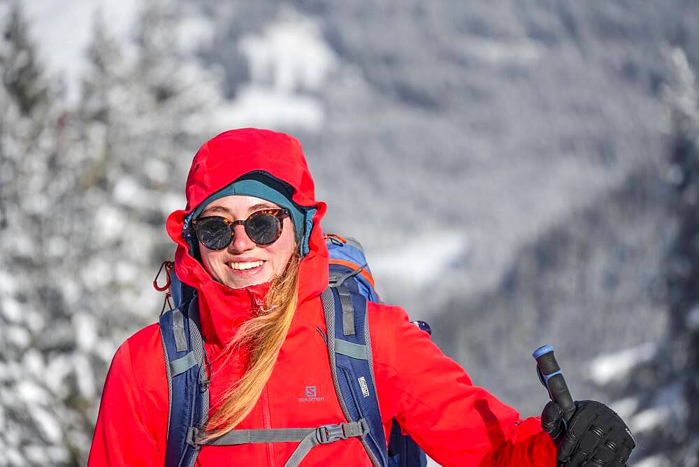 Young woman on ski tour, ski tourers on tour to Teufelstaettkopf, Ammergau Alps, Unterammergau, Bavaria, Germany, Europe