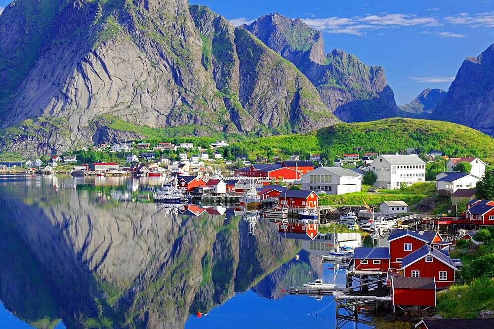 Silent fjord and mountains, Rorbuer, typical wooden houses, Reine, Reinefjord with mountains, Lofoten, Nordland, Norway, Europe