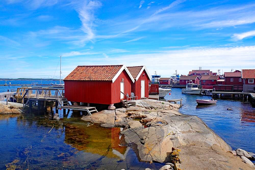 Rocks, boathouses and wooden houses on the archipelago island of Gullholmen, Sweden, Europe