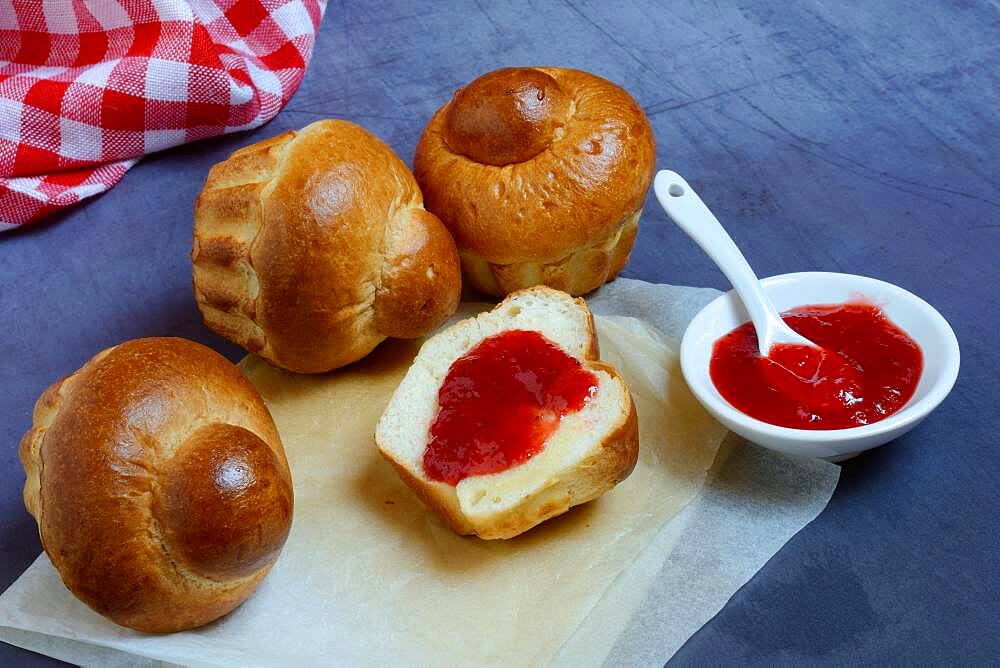 Brioche, brioches and small bowls with jam, Germany, Europe