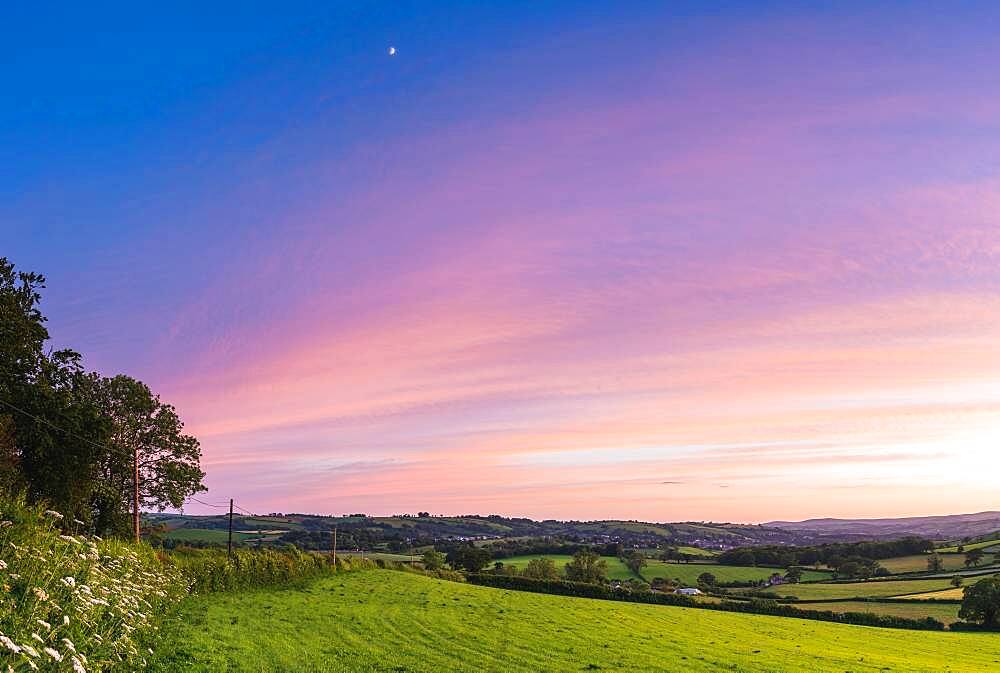 Sunset over Totnes fields, Berry Pomeroy Village, Devon, England, United Kingdom, Europe