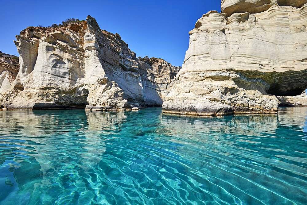 Crystal clear turquoise water and mighty rock formations, Kleftiko, Milos, Cyclades, Greece, Europe