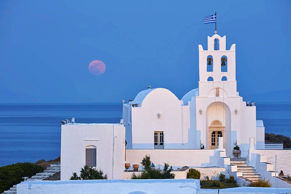 Full moon behind the monastery Chrisopigi on Sifnos, Cyclades, Greece, Europe