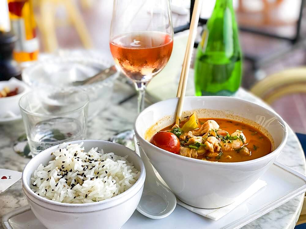 Asian soup in coconut sauce with shrimp and fish with rice, Port Andratx, Majorca, Spain, Europe