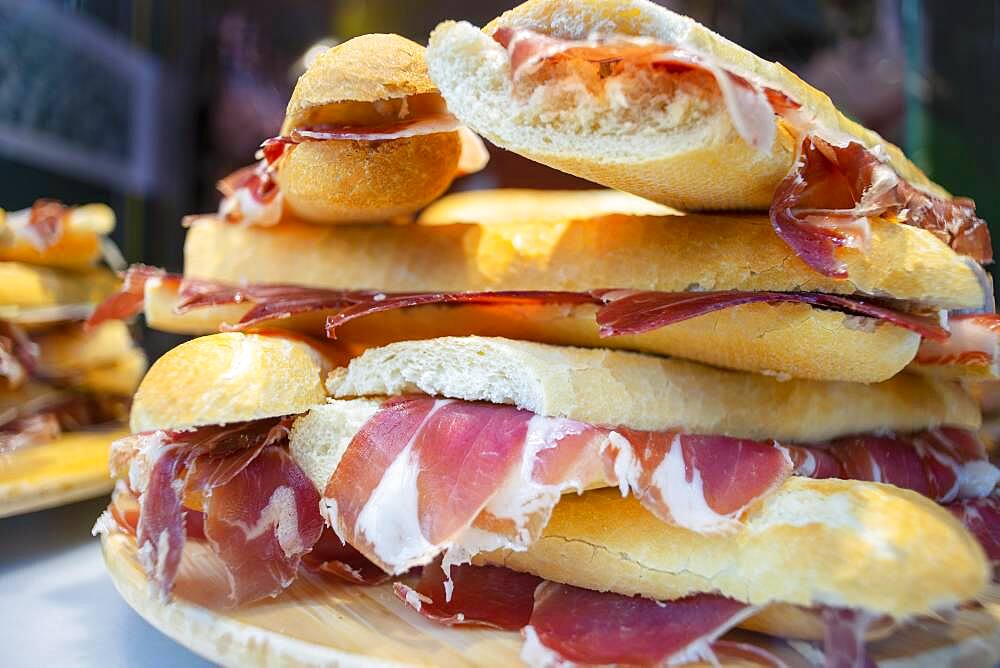 Plenty of tasty sandwiches with Spanish ham called jamon