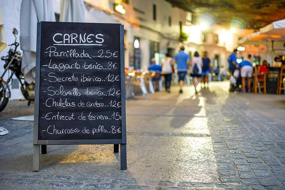 Menu of the meats of restaurant in the sidewalk of Setenil de las Bodegas, Andalucia, Spain, Europe