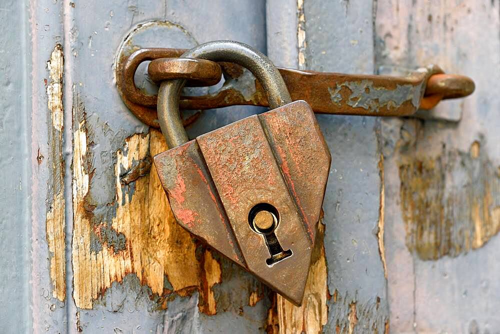 Old padlock hanging on a wooden door, Fischen, Allgaeu Alps, Allgaeu, Bavaria, Germany, Europe