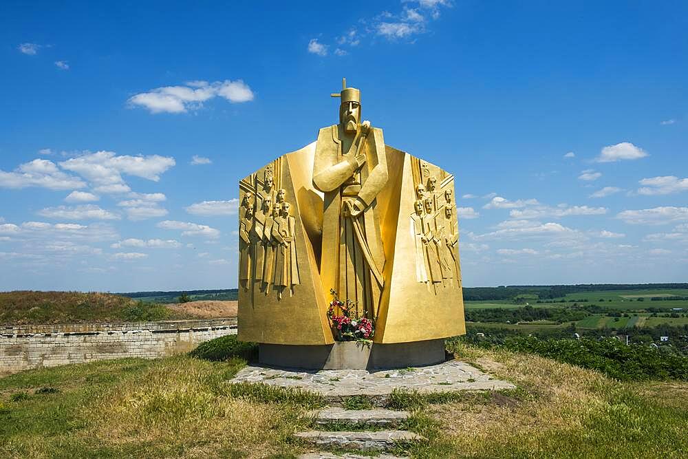 Golden statue at the entrance to Khotyn Fortress on the river banks of the Dniester, Ukraine, Europe