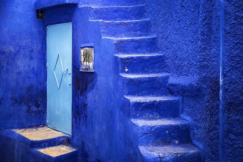 Streets and colored houses, View from the city street where all buildings are painted only in blue, the neighborhoods painted in vivid blue colors Cali, Colombia, South America