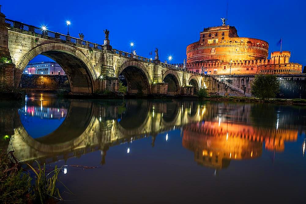 Bridge of Angels and Castel Sant'Angelo, blue hour, reflection in the Tieber, Rome, Italy, Europe