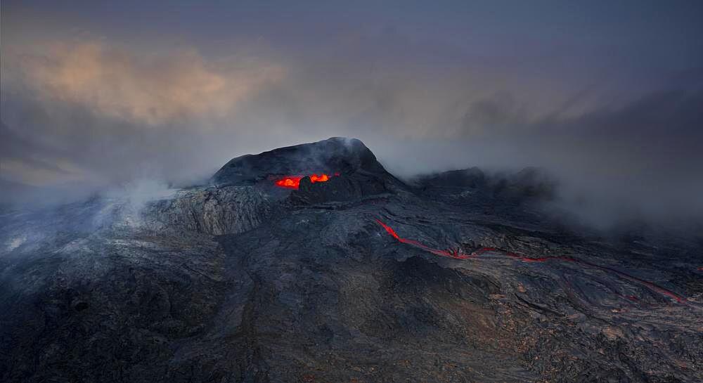 Aerial view, erupting volcano with lava fountains and lava field, crater with erupting lava and lava flow, Fagradalsfjall, Reykjanes Peninsula, Iceland, Europe