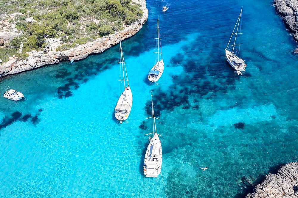 Aerial view, Cala Sa Nau, near Cala d'Or, with beaches and sailing boats Migjorn region, Majorca, Balearic Islands, Spain, Europe