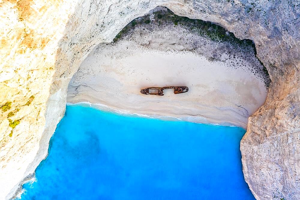 Beach shipwreck Navagio Beach drone shot bird's eye view in Zakynthos, Greece, Europe