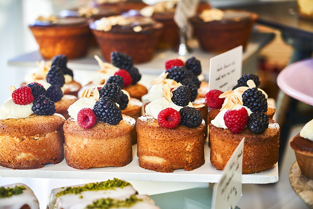 Cake displays in the shop window, London, England, Great Britain