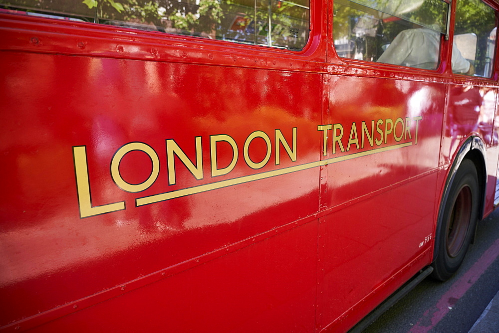 London Transport lettering on old red bus, London, England, United Kingdom, Europe