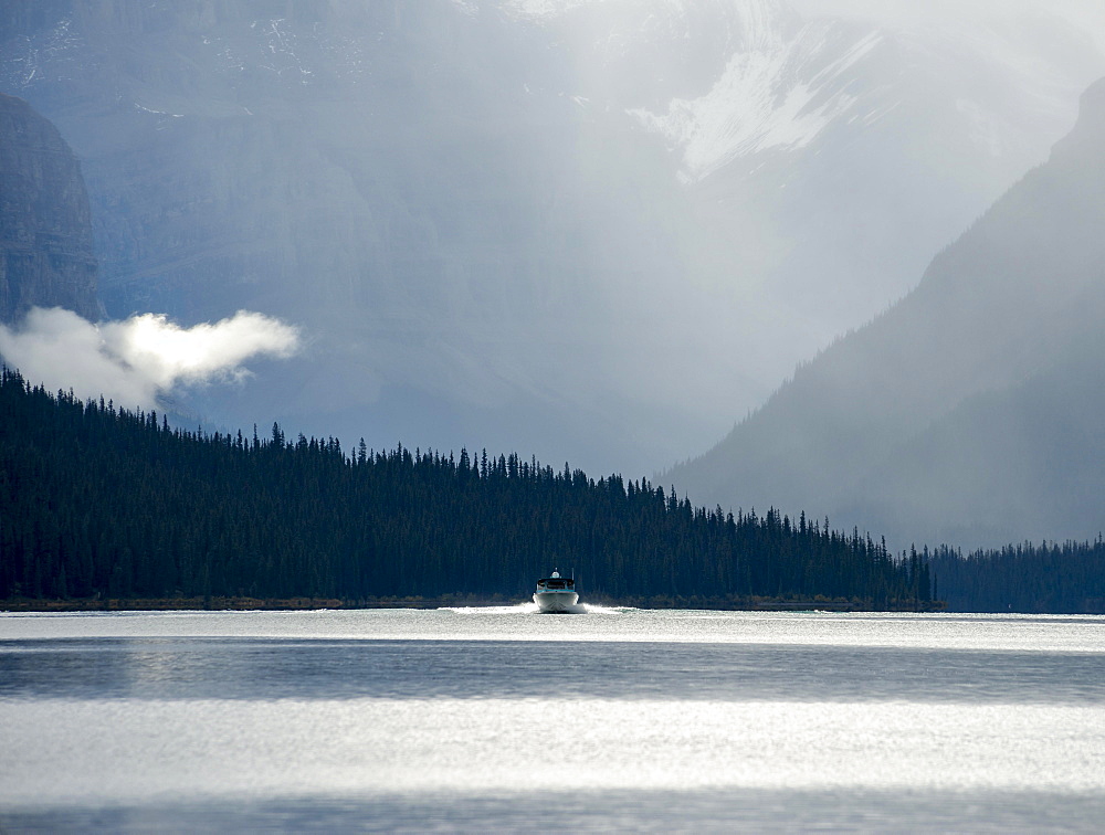 Boat on Maligne Lake, Cloudy Sky, Jasper National Park, Rocky Mountains, Alberta, Canada, North America