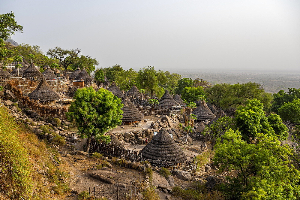 Tradtional build huts of the Otuho or Lutoko tribe in a village in the Imatong mountains, Eastern Equatoria, South Sudan, Africa