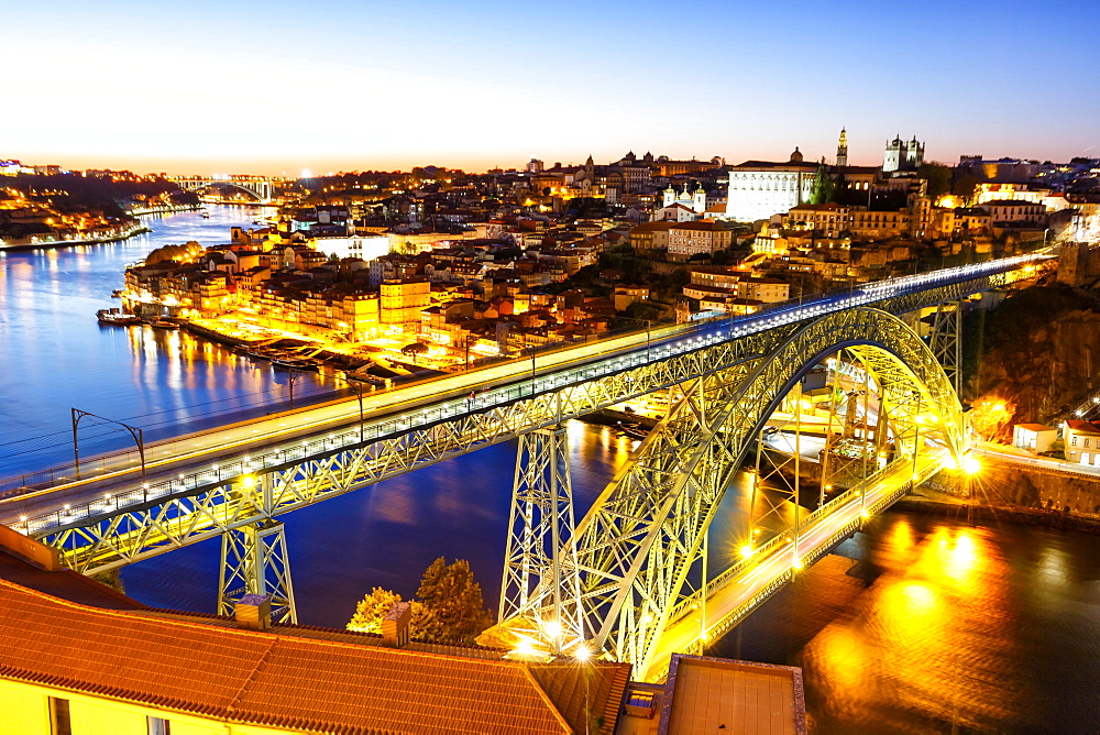 Porto with bridge Ponte Dom Luis I over river Douro night evening travel city in Porto, Portugal, Europe