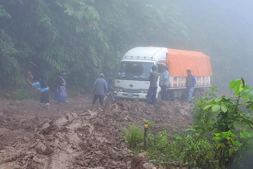 Truck stuck in mud on Ruta 3 in fog, Yungas, near Caranavi, La Paz Department, Bolivia, South America