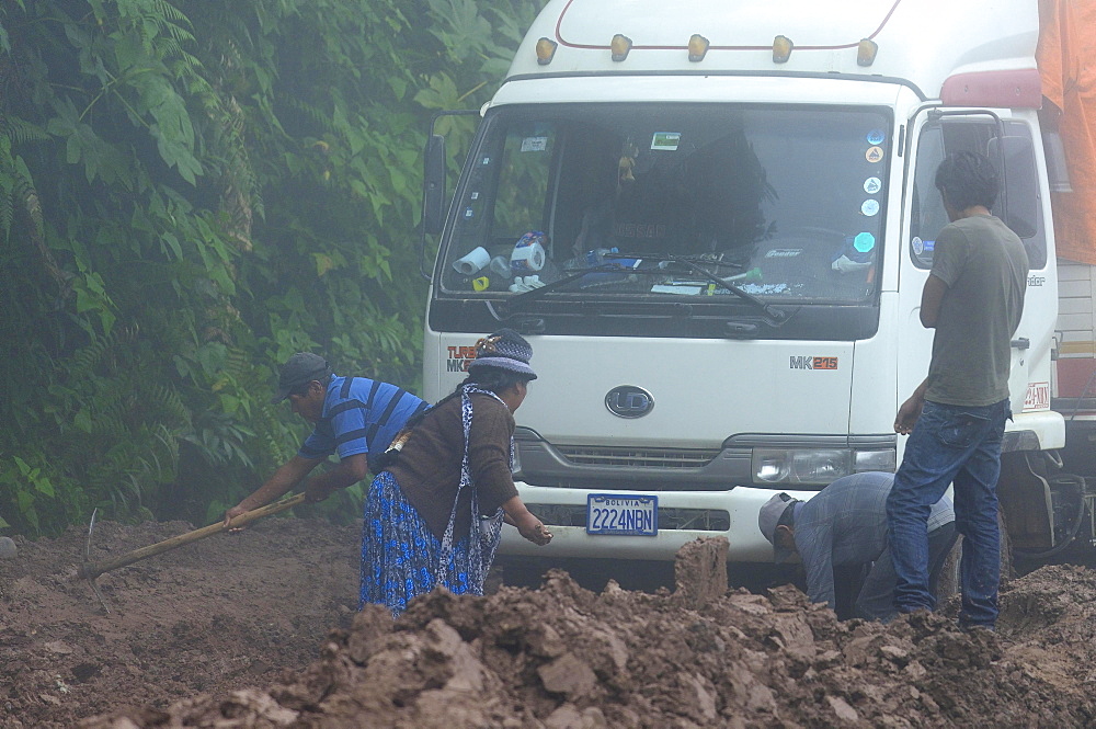 Truck stuck in mud on Ruta 3 in fog, Yungas, near Caranavi, La Paz Department, Bolivia, South America