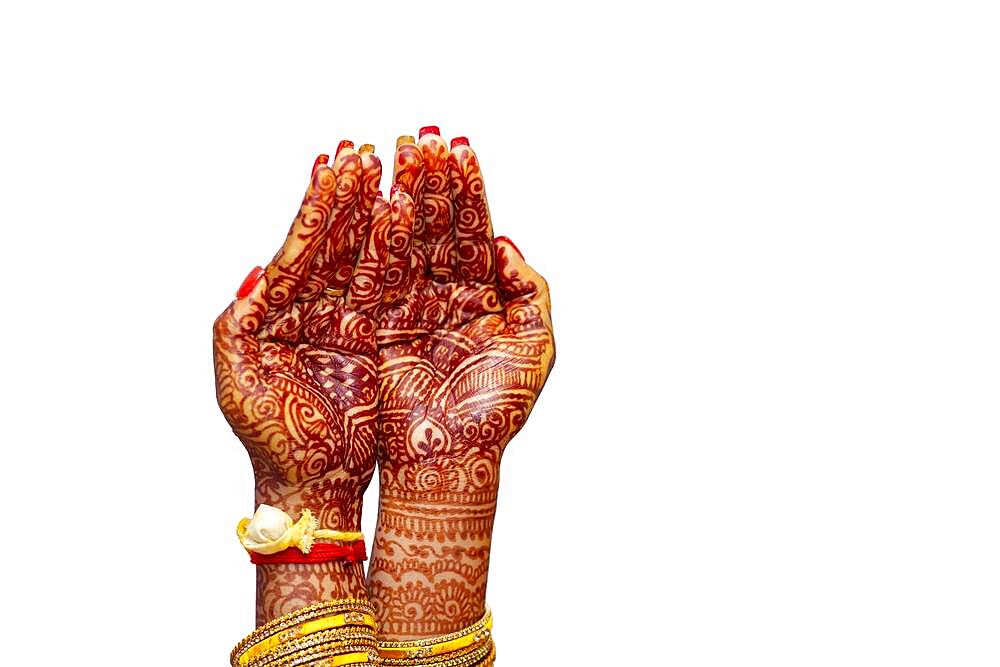 Indian Bride's hand painted with mehndi isolated on white background. Mauritius