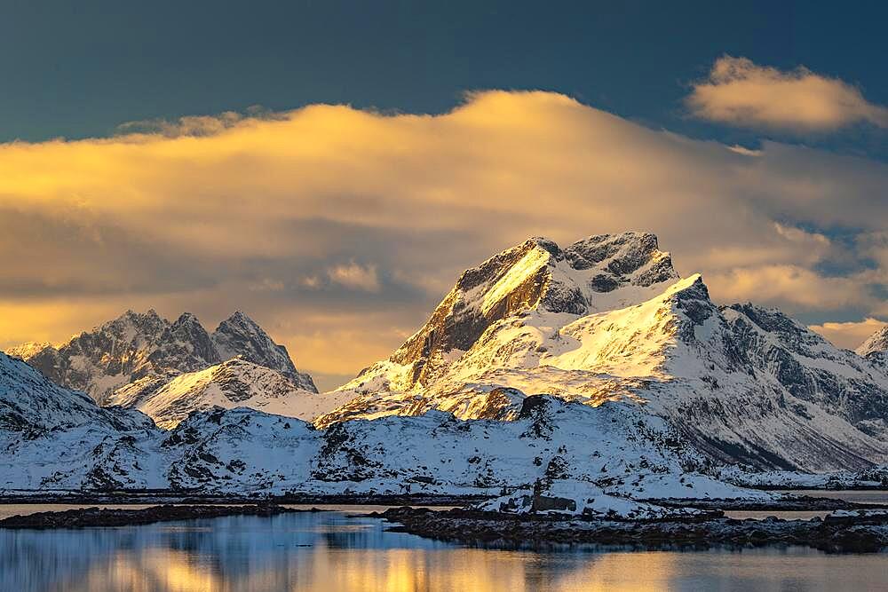 Winter Scandinavian landscape at sunrise, mountains, snow, fjord, Norway in winter, Ramberg, Nordland, Lofoten, Norway, Europe