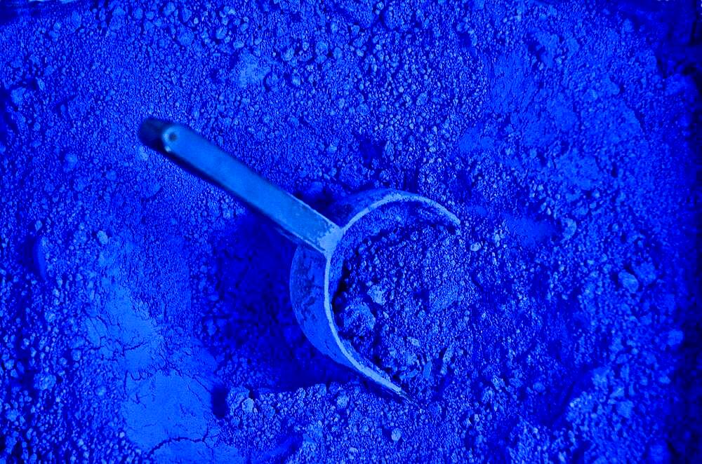 Shovel in bag with blue paint powder, Blue paint pigments, Blue city, Chefchaouen, Tangier-Tetouan-Al Hoceima, Morocco, Africa