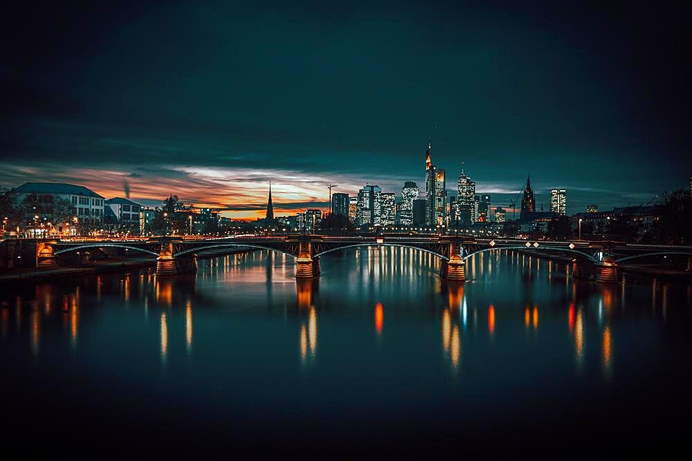 View of Frankfurt and the illuminated Frankfurt skyline, Commerzbank, Hessische Landesbank, Deutsche Bank, European Central Bank, Skyper, Sparkasse, DZ Bank, long exposure, sunset, night shot in Petrol style, Frankfurt, Hesse, Germany, Europe