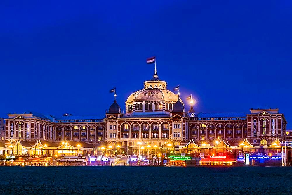 Steigenberger spa hotel Hotel, a luxury hotel on the promenade of Scheveningen, a modern seaside resort grown together with The Hague on the Dutch North Sea coast, illuminated, Blue Hour, Province of Zuid-Holland, Zuid-Holland, Netherlands