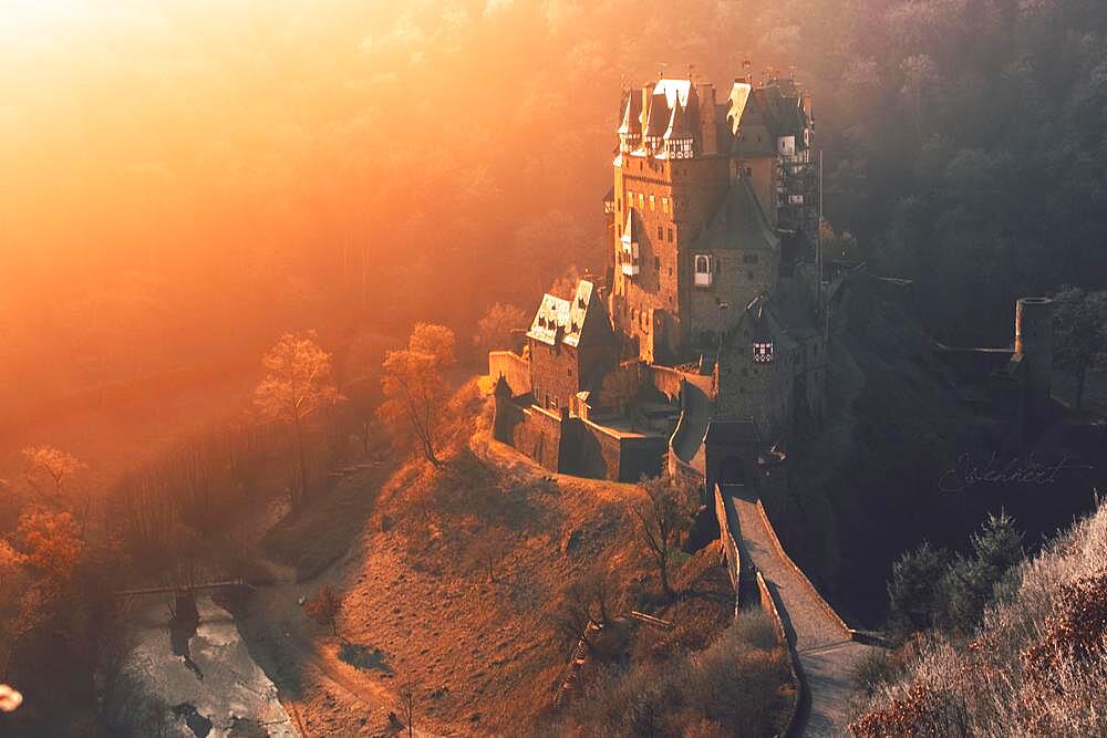 Eltz Castle, winter and sunrise, Ganerbenburg, Muenstermaifeld, Wierschem, Moselle, Rhineland-Palatinate, Germany, Europe