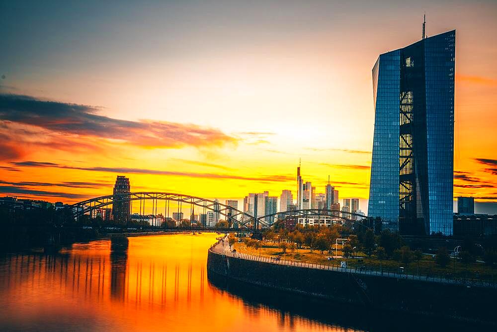 Sunset behind European Central Bank, ECB and Frankfurt skyline from Arthur-von-vineyard-Steg, Frankfurt am Main, Hesse, Germany, Europe