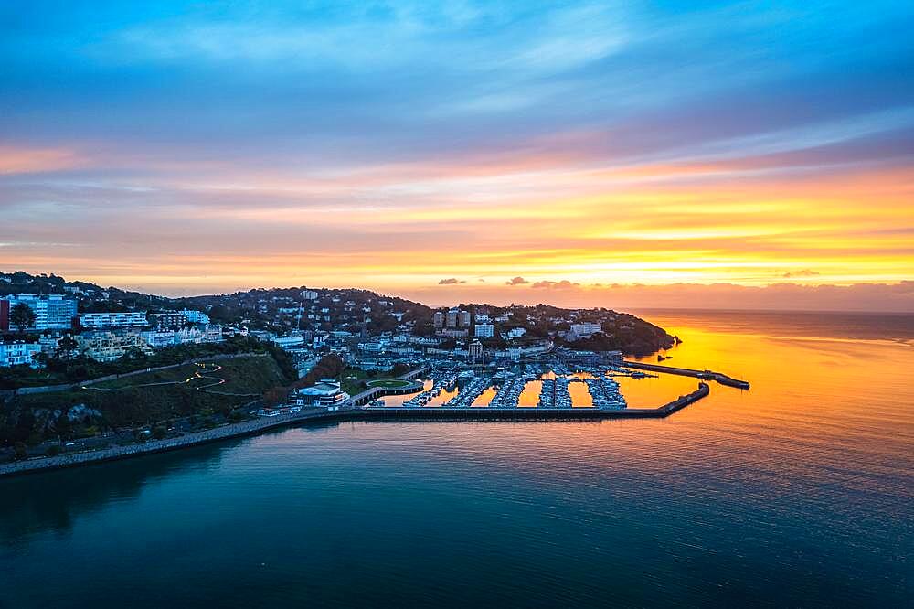 View over Torquay and Torquay Marina from a drone in sunrise time, Torbay, Devon, England, United Kingdom, Europe