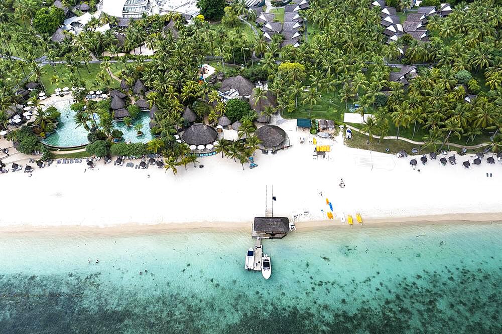 Aerial view, The beach of Flic en Flac with the luxury hotel La Pirogue Resort & Spa and palm trees, Mauritius, Africa