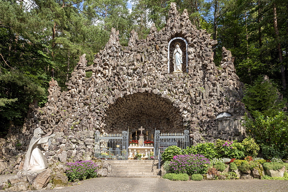 Marien Grotto pilgrimage site in the forest, replica of the Lourdes grotto with statue of St. Bernadette Soubirous, altar, statue of the Virgin Mary, Bad Salzschlirf, Vogelsberg and Roehn, Fulda, Hesse, Germany, Europe