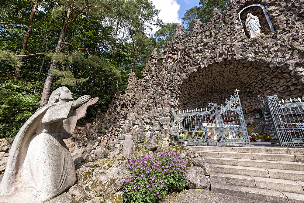 Marien Grotto pilgrimage site in the forest, replica of the Lourdes grotto with statue of St. Bernadette Soubirous, altar, statue of the Virgin Mary, Bad Salzschlirf, Vogelsberg and Roehn, Fulda, Hesse, Germany, Europe