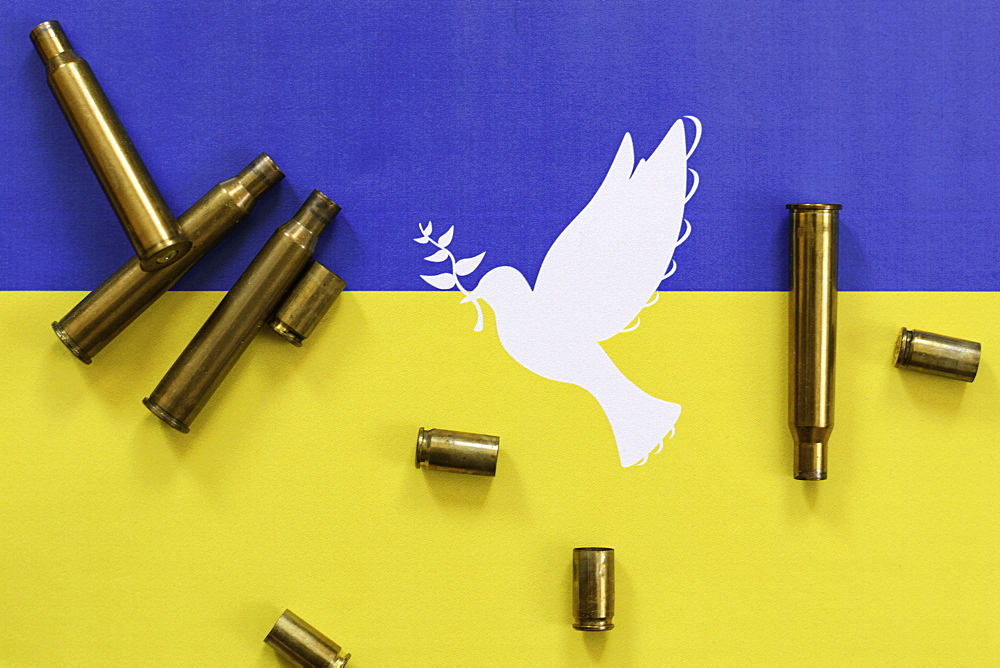 Ukrainian flag with peace dove and cartridge cases, Ukrainian War