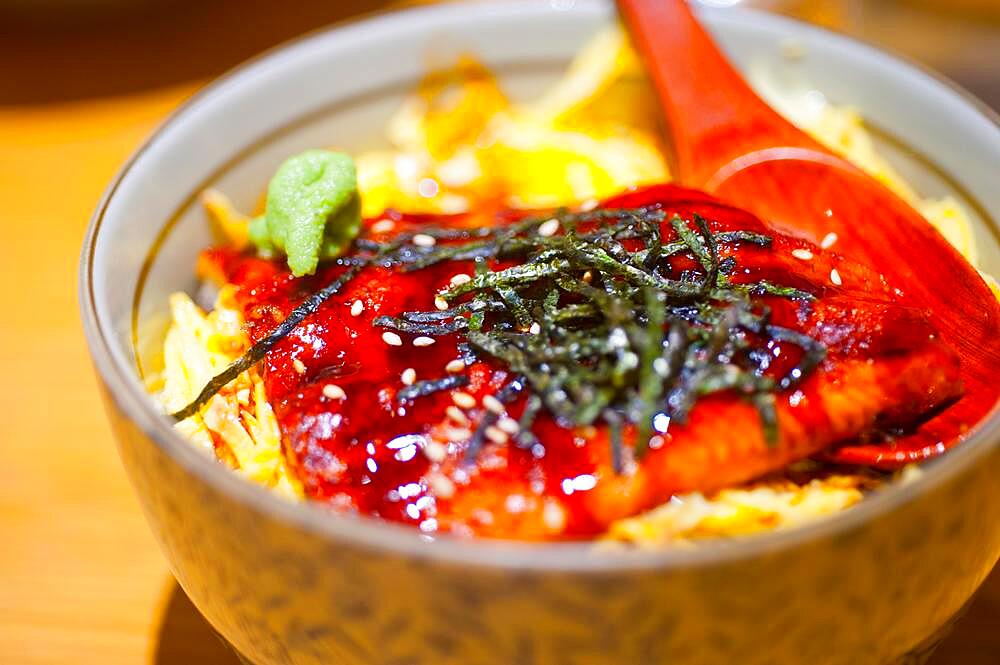 Traditional Japanese ramen noodles with unagi eel on top