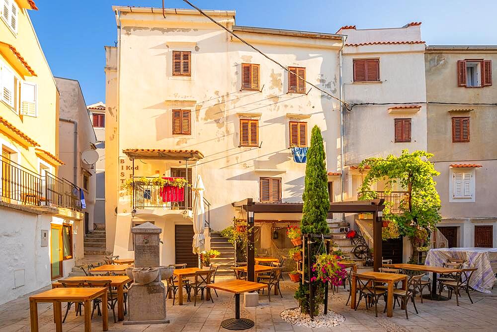 Mediterranean old town with old streets and houses in the morning, restaurant, Baska, island Krk, Croatia, Europe