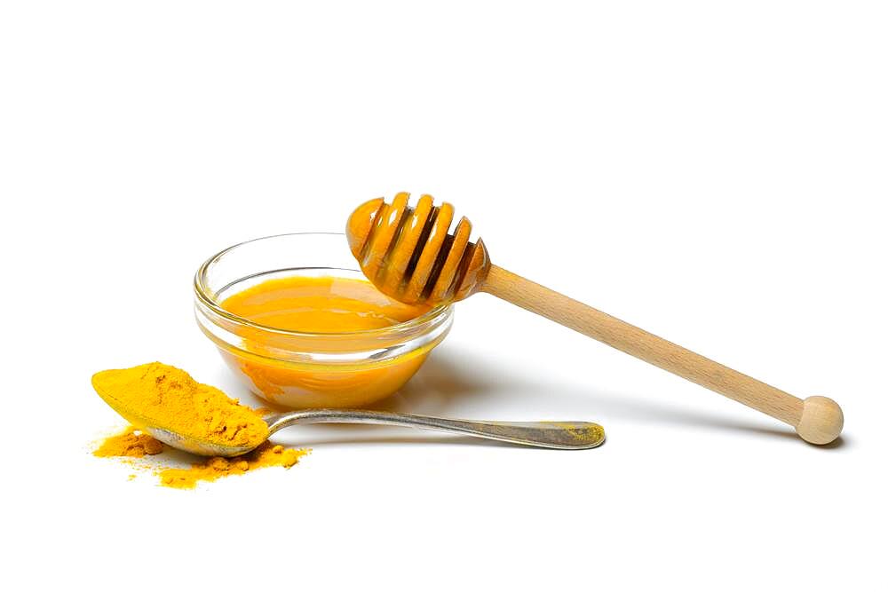 Bee honey with turmeric and turmeric powder, ingredient for Golden Milk, healthy milk drink