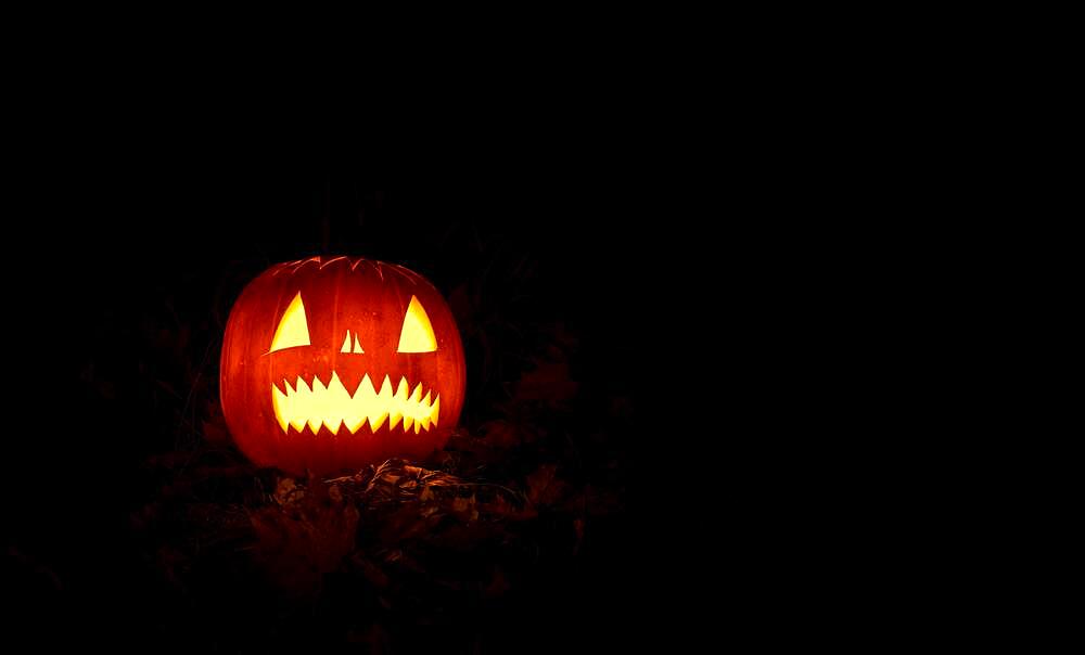 Glowing pumpkins at night, pumpkin face, carved pumpkins, grimace, halloween, dark background