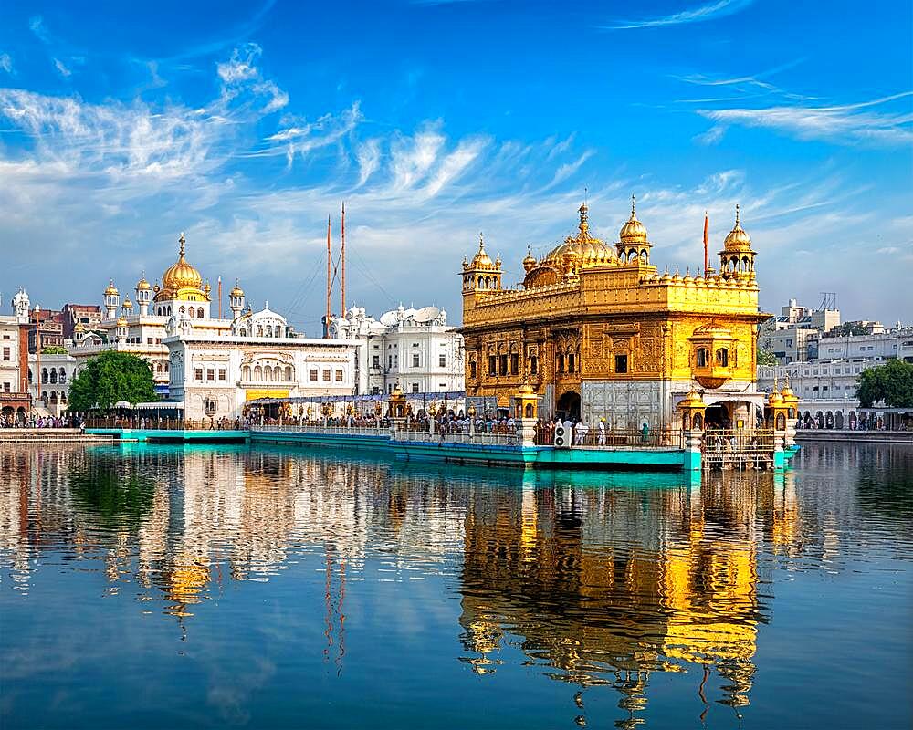 Panorama of Sikh gurdwara Golden Temple (Harmandir Sahib) and water tank. Amritsar, Punjab, India, Asia