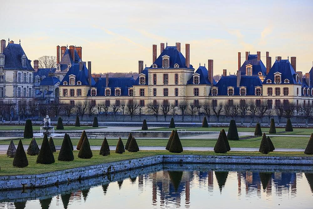 Fontainebleau Castle and Park, seen just in front of sunset from the Grand Parterre, UNESCO World Heritage Site, Seine-et-Marne department, Ile-de-France region, France, Europe