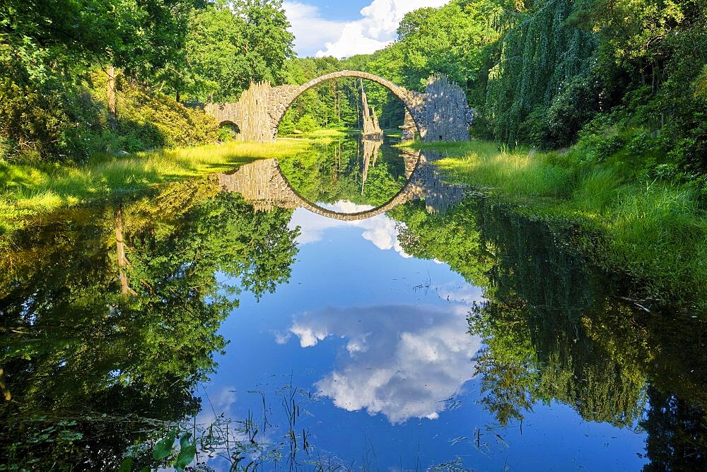 Rakotz Bridge, also Devil's Bridge, and basalt columns, the organ, in the Azalea and Rhododendron Park Kromlau, Gablenz, Saxony, Germany, Europe