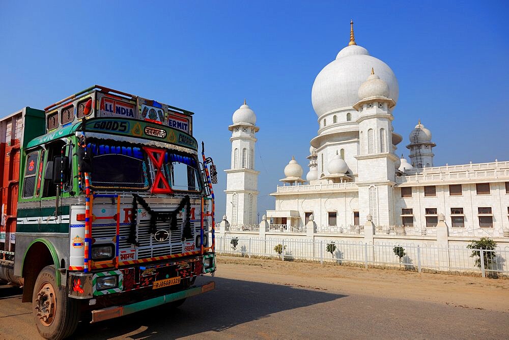 State of Uttar Pradesh, colourful truck in front of a white Sihk temple in Mathura, India, Asia