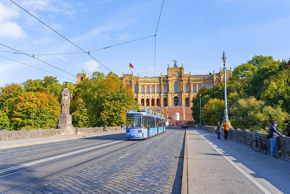 Tramway on the Maximiliansbruecke, Maximilianeum in autumn, Munich, Bavaria, Germany, Europe