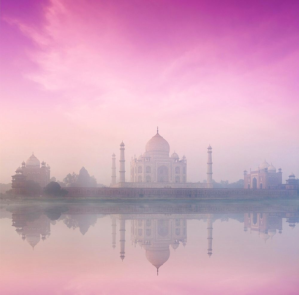 Taj Mahal on sunrise sunset reflection in Yamuna river panorama in fog, Indian Symbol, India travel background. Agra, Uttar Pradesh, India, Asia