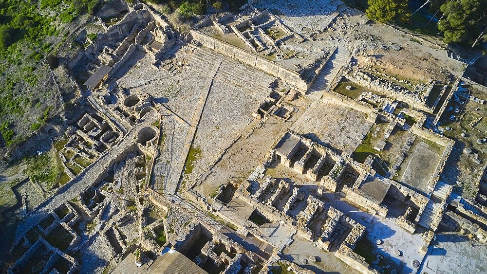 Drone shot, afternoon light, stairs, building, cistern, Minoan Palace of Festos, Messara Plain, Central Crete, Crete Island, Greece, Europe